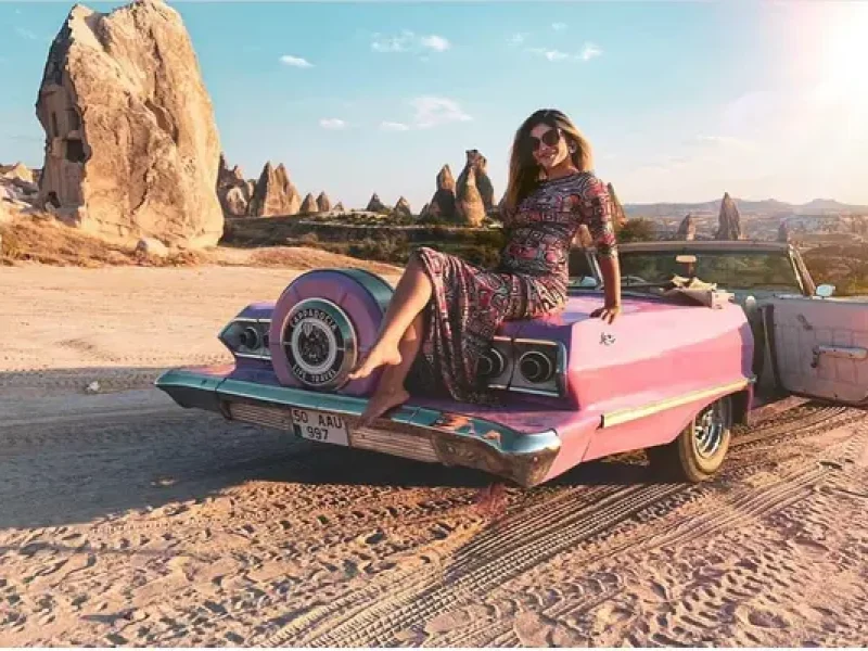 Vintage car tour Cappadocia, Pink convertible Cappadocia, Retro photoshoot Göreme, Stylish Cappadocia tours, Scenic Cappadocia drives