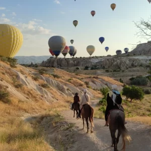 Cappadocia horseback tours with balloons, sunrise riding experiences, hot air balloon valley rides, scenic trails in Cappadocia, outdoor adventures with balloons