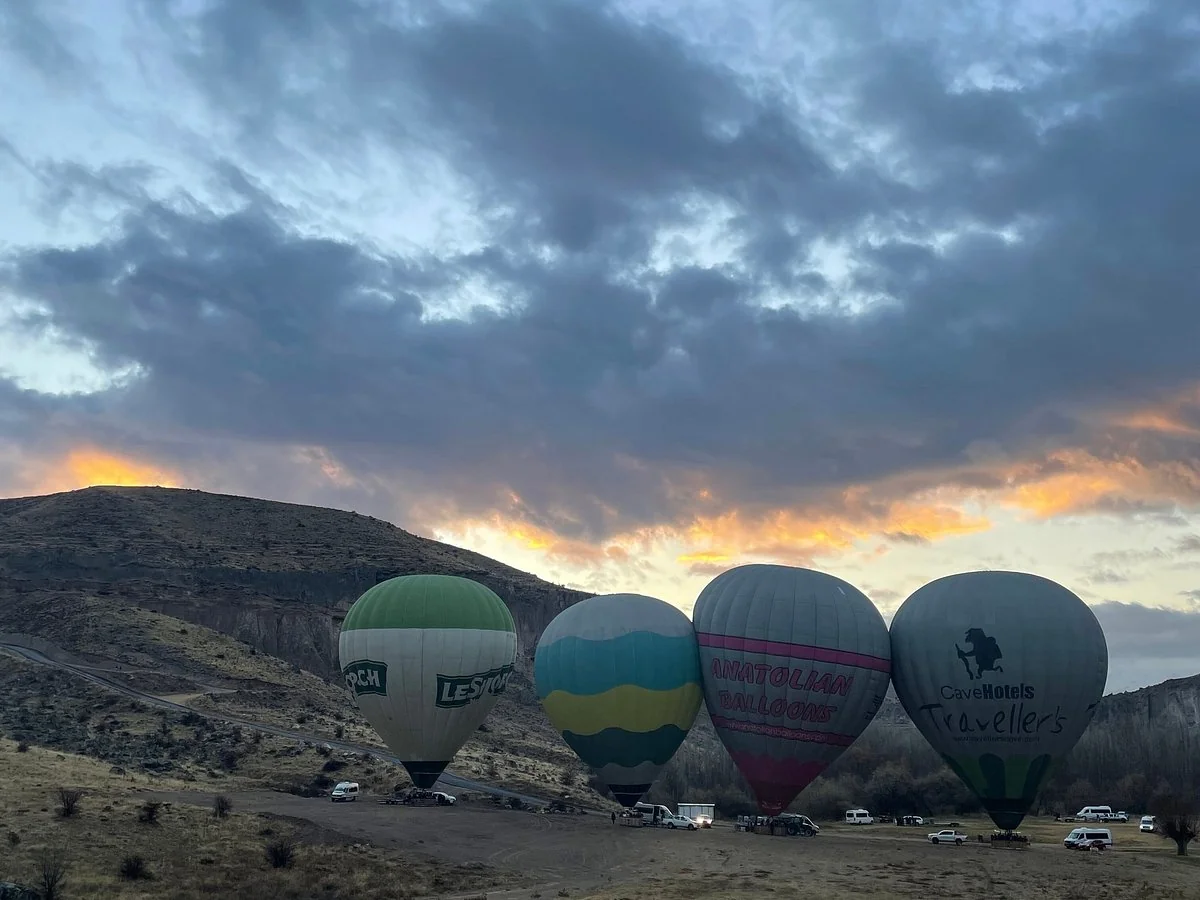 Hot air balloon takeoff at dawn in Soganli valley in Cappadocia