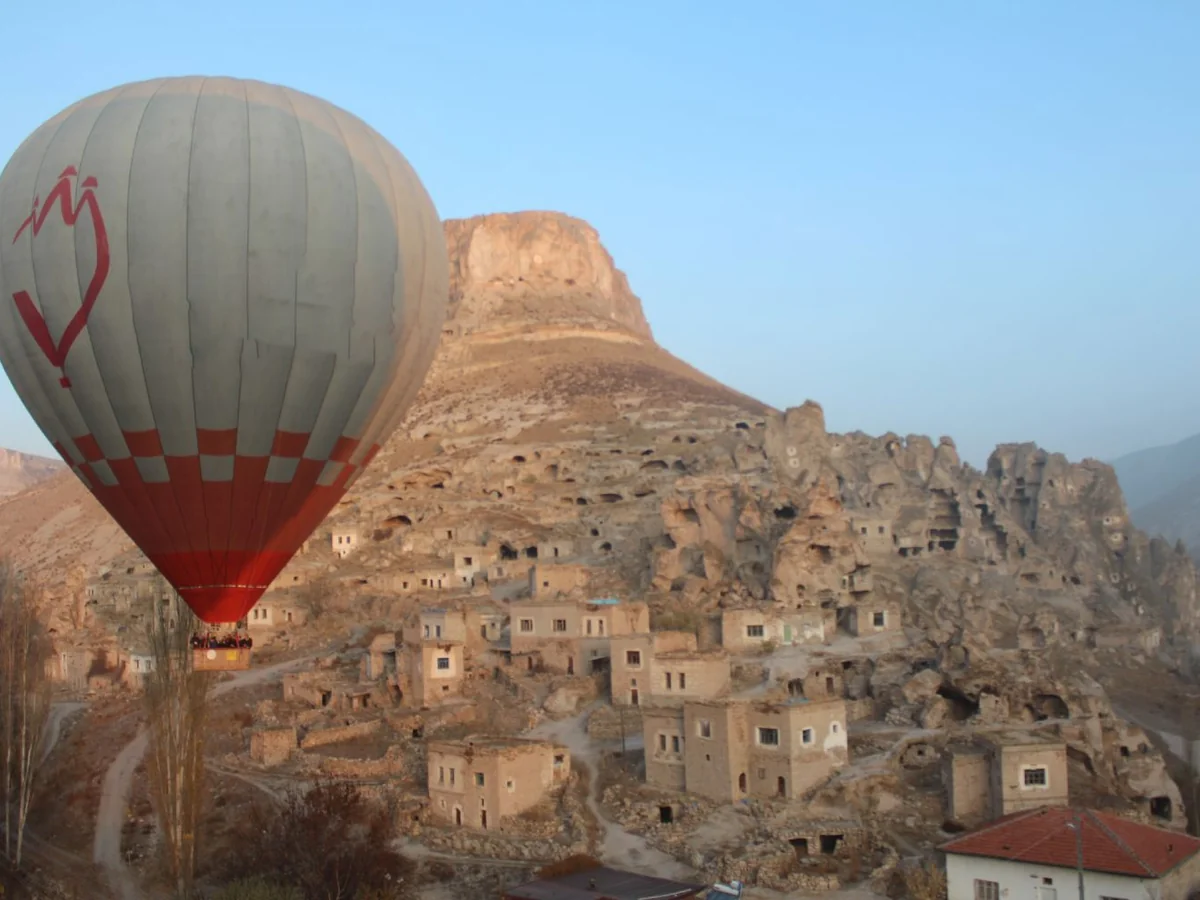 Sunrise hot air balloon over Soganli village in Cappadocia