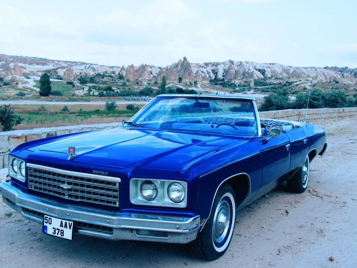 Blue classic convertible car on a Cappadocia vintage car tour