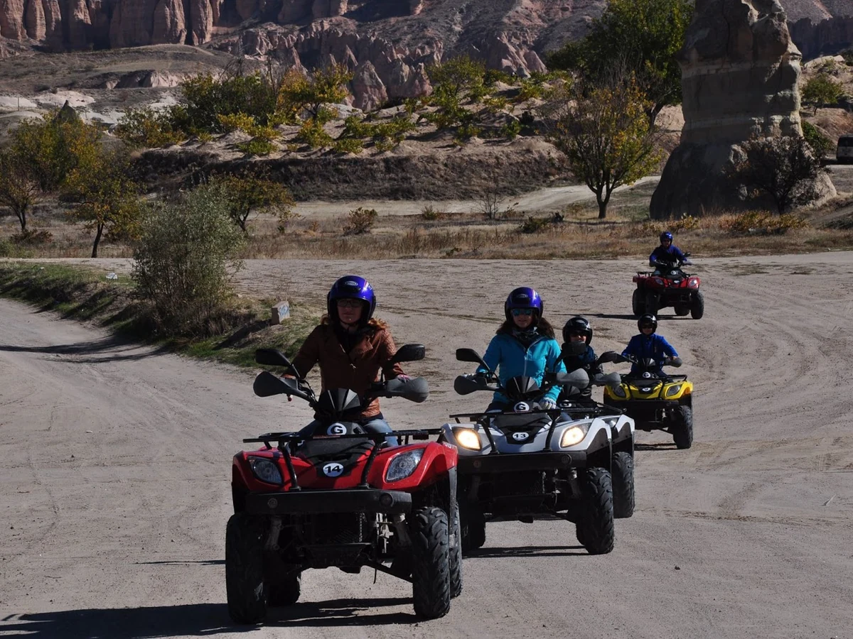 ATV riders following their guide through Cappadocia during the day