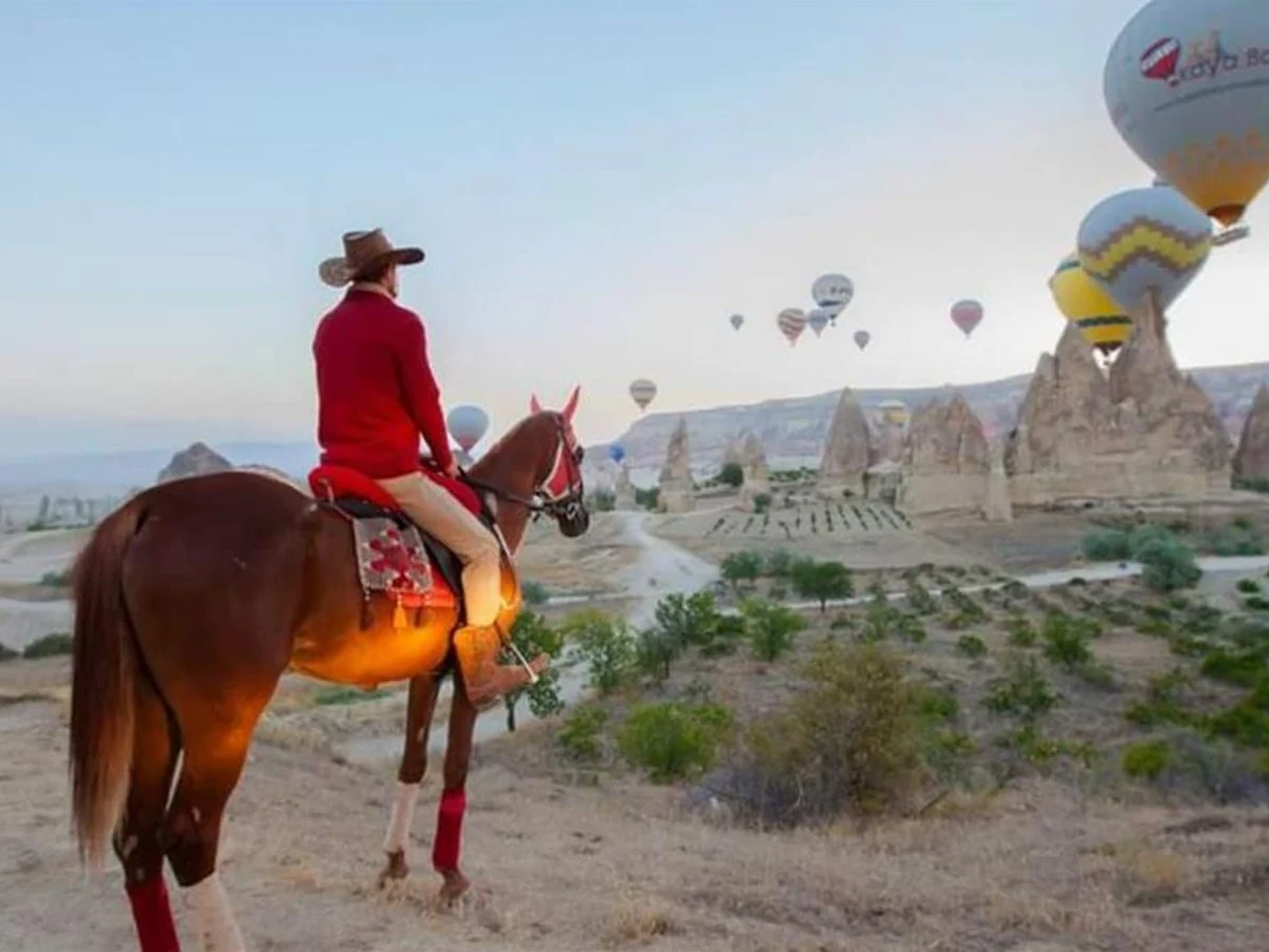 Morning horseback tour across the scenic landscape of Cappadocia