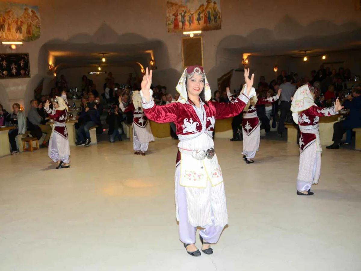Female folk dancers in traditional costumes at a Cappadocia Turkish Night Show