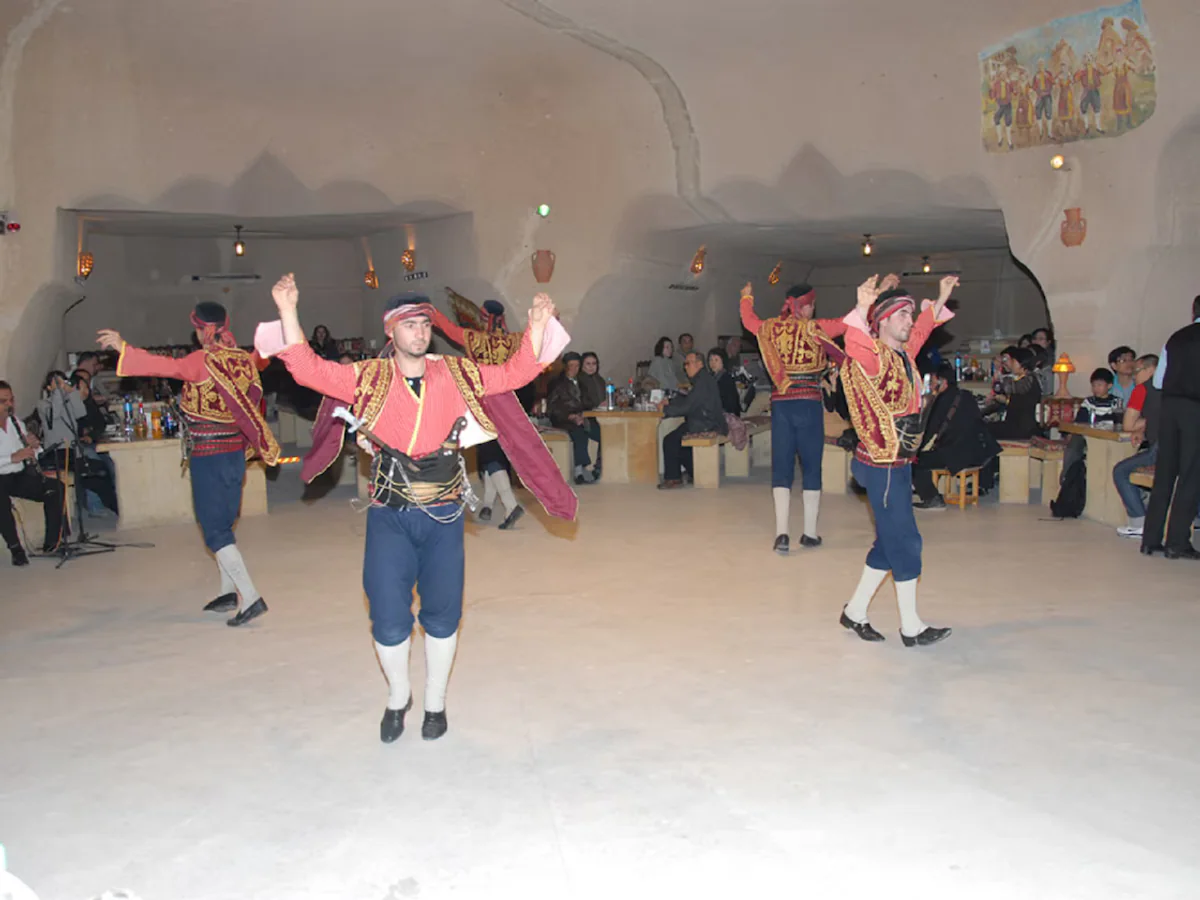 Colorful folk dance performance at a Turkish Night Show in Cappadocia