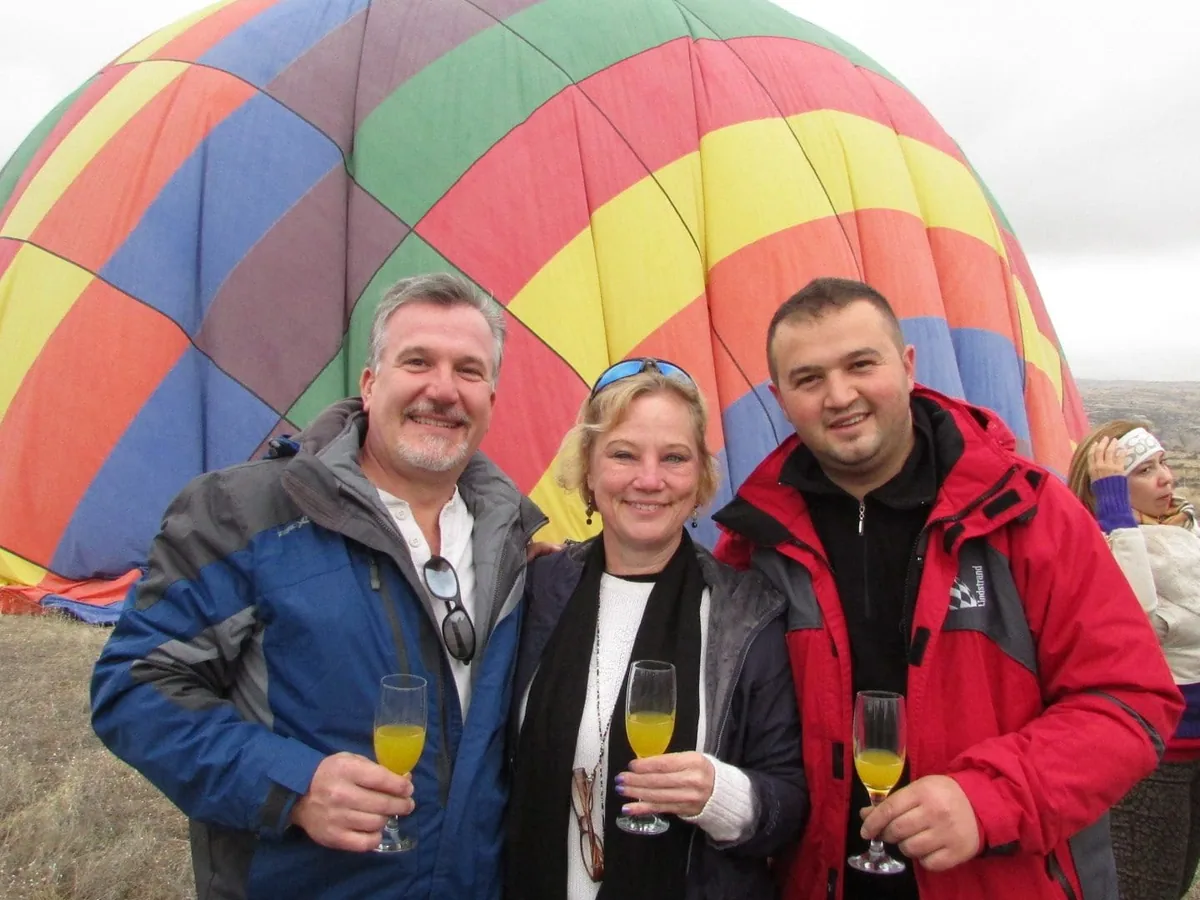 Champagne toast after Cappadocia hot air balloon landing