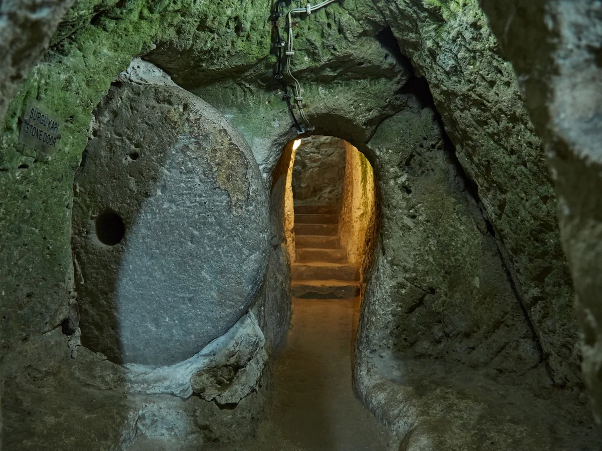 Circular stone door inside Derinkuyu Underground City in Cappadocia