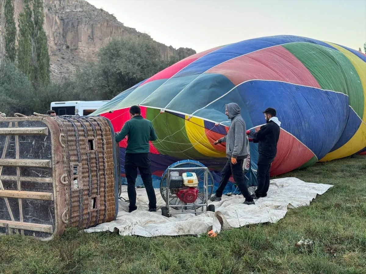 Hot air balloon ground crew preparing for flight in Cappadocia