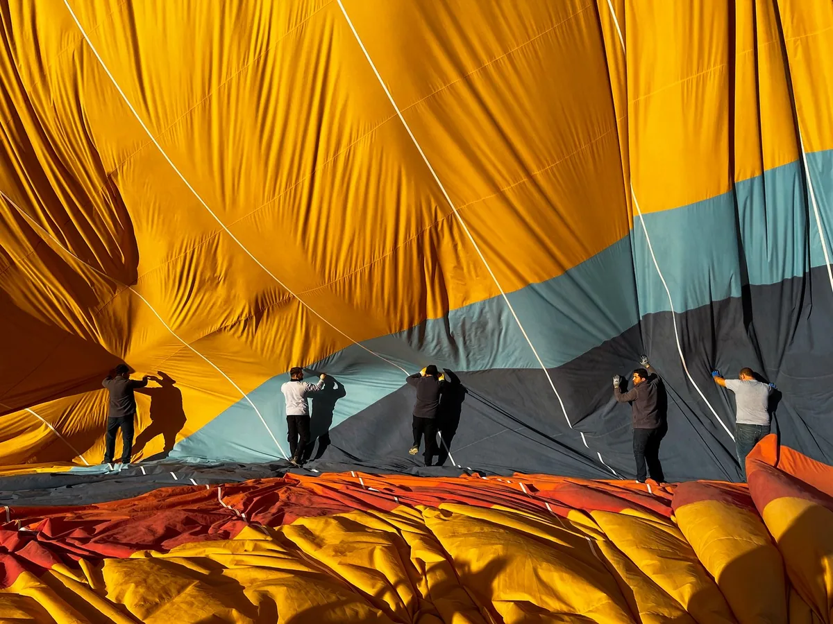 Cappadocia Hot air balloon inflation at sunrise