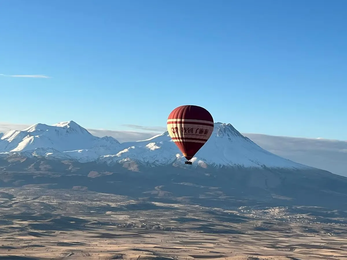 Hot air balloon over Mount Hasan near Ihlara Valley in Cappadocia