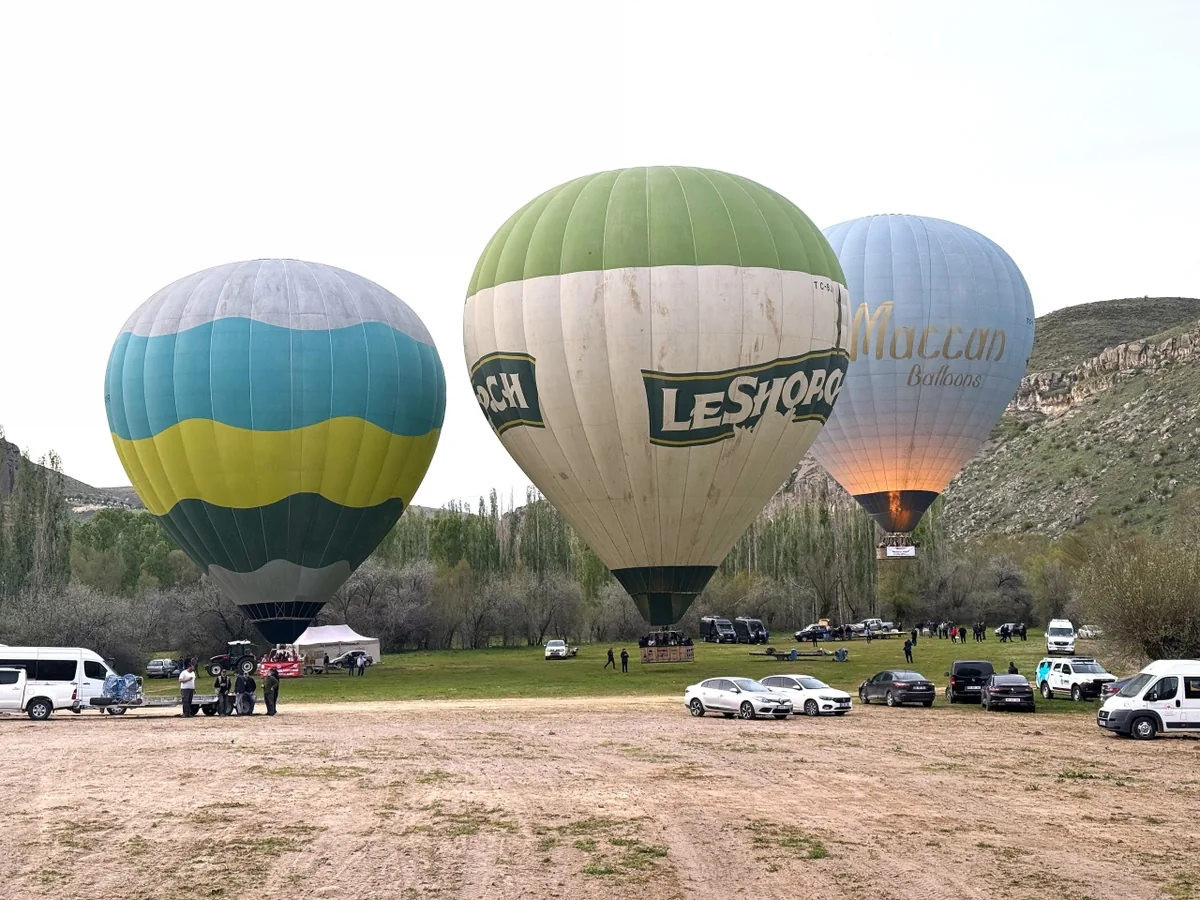 Hot air balloons preparing for Ihlara Valley takeoff in Cappadocia