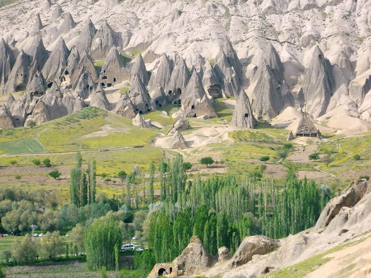 Fairy chimneys and green landscape in Pigeon Valley, Cappadocia
