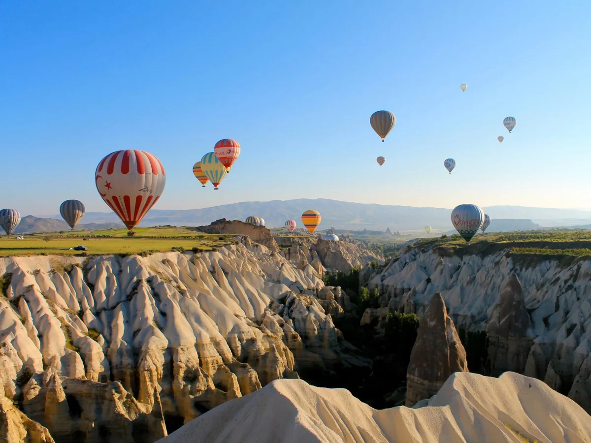 Private balloon view over Cappadocia caves