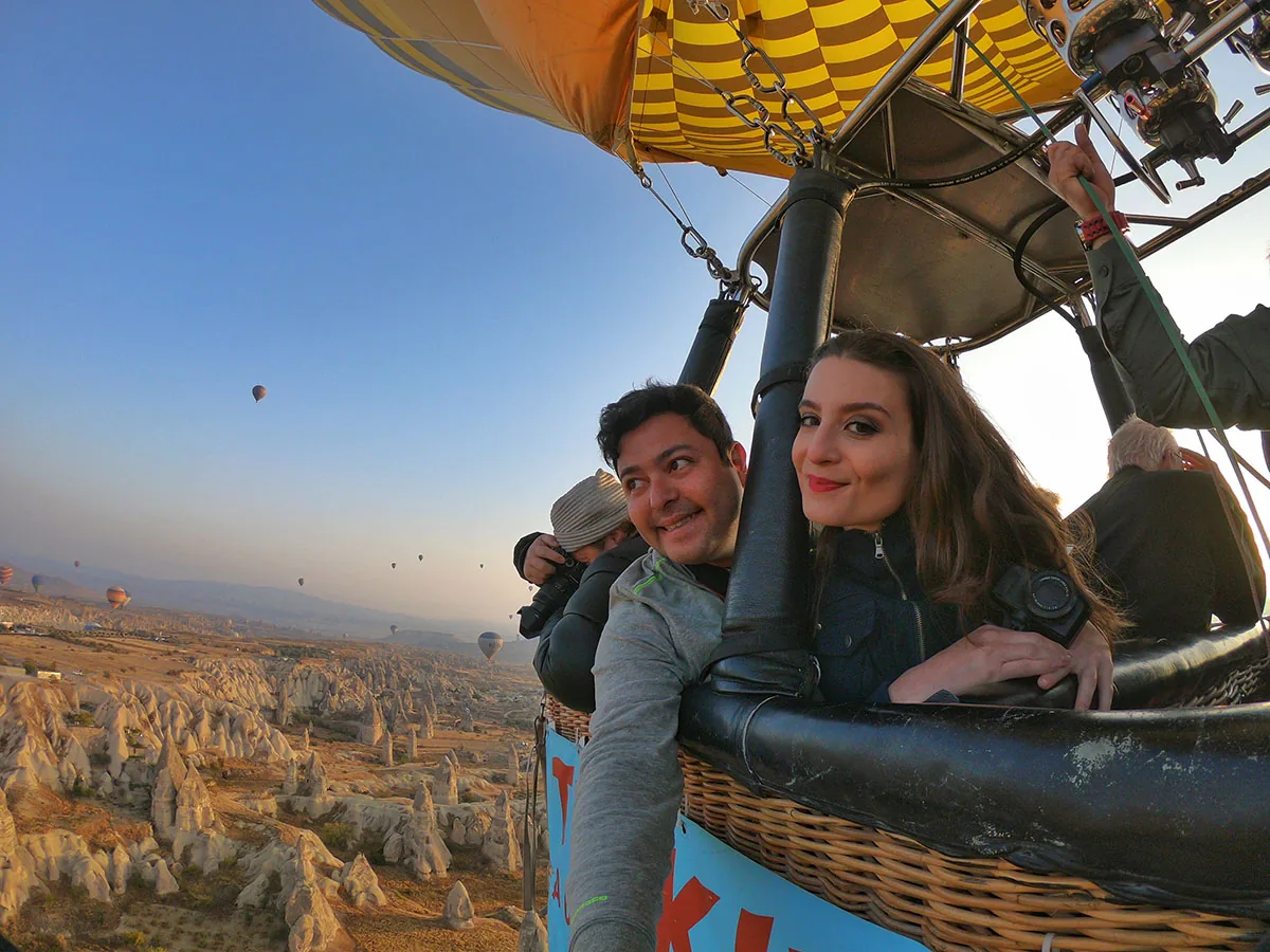 Romantic couple enjoying Cappadocia hot air balloon flight