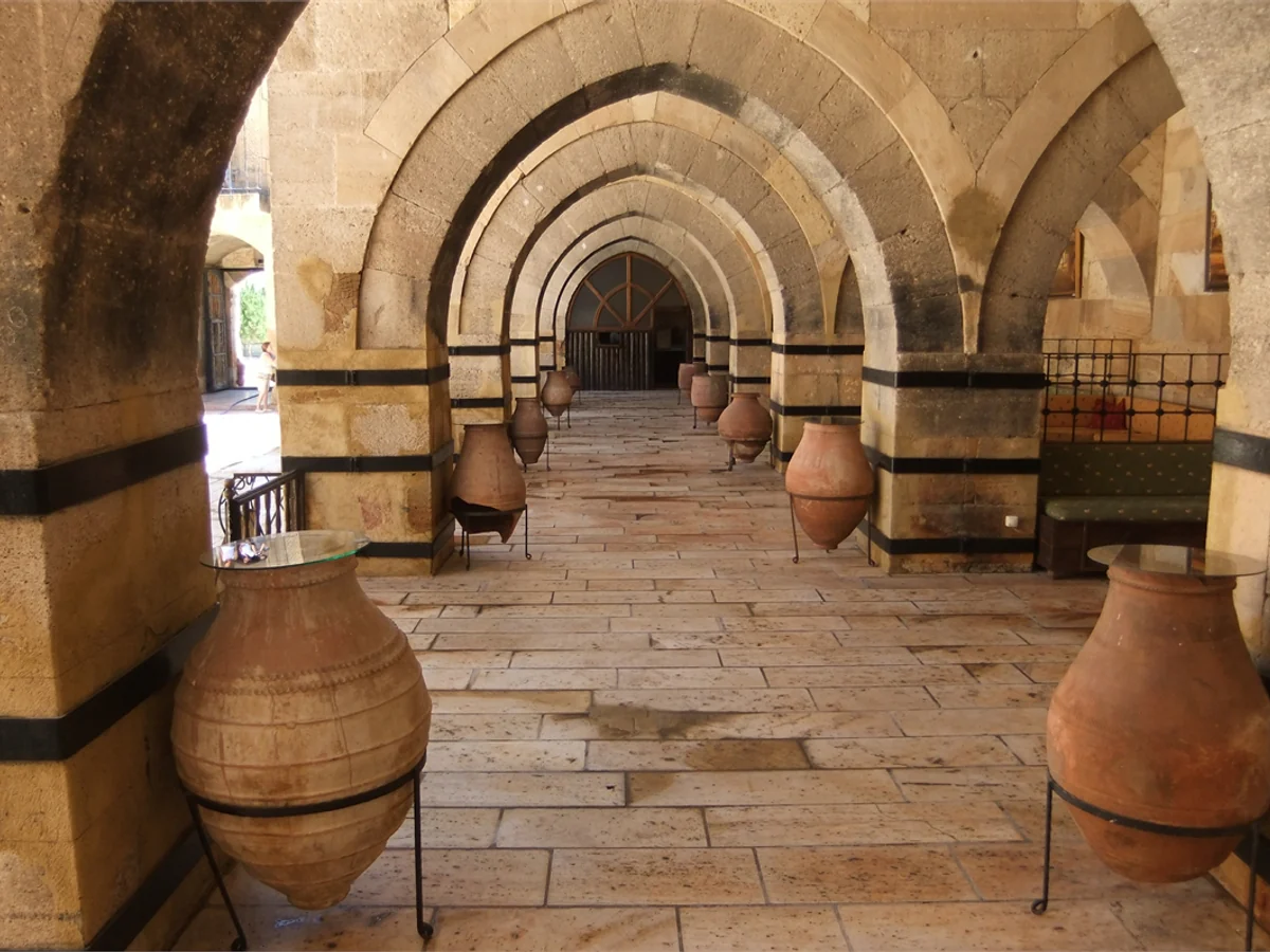 Historic stone arches inside Saruhan Caravanserai in Cappadocia