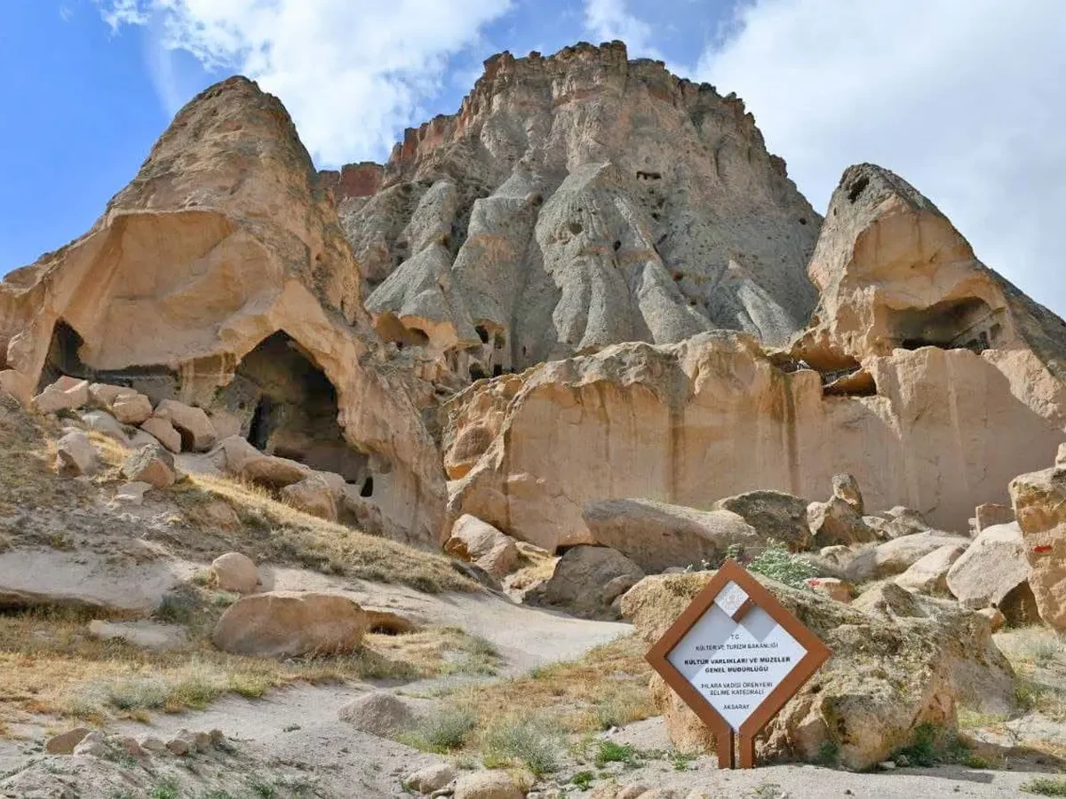 Exterior rock formations and cave entrances at Selime Monastery on a private Cappadocia Green Tour
