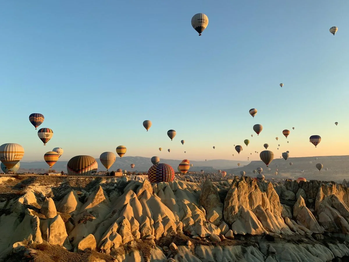 Sky filled hot air balloons in Cappadocia