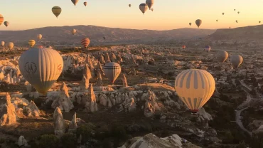 Sunrise hot air balloons over goreme in Cappadocia