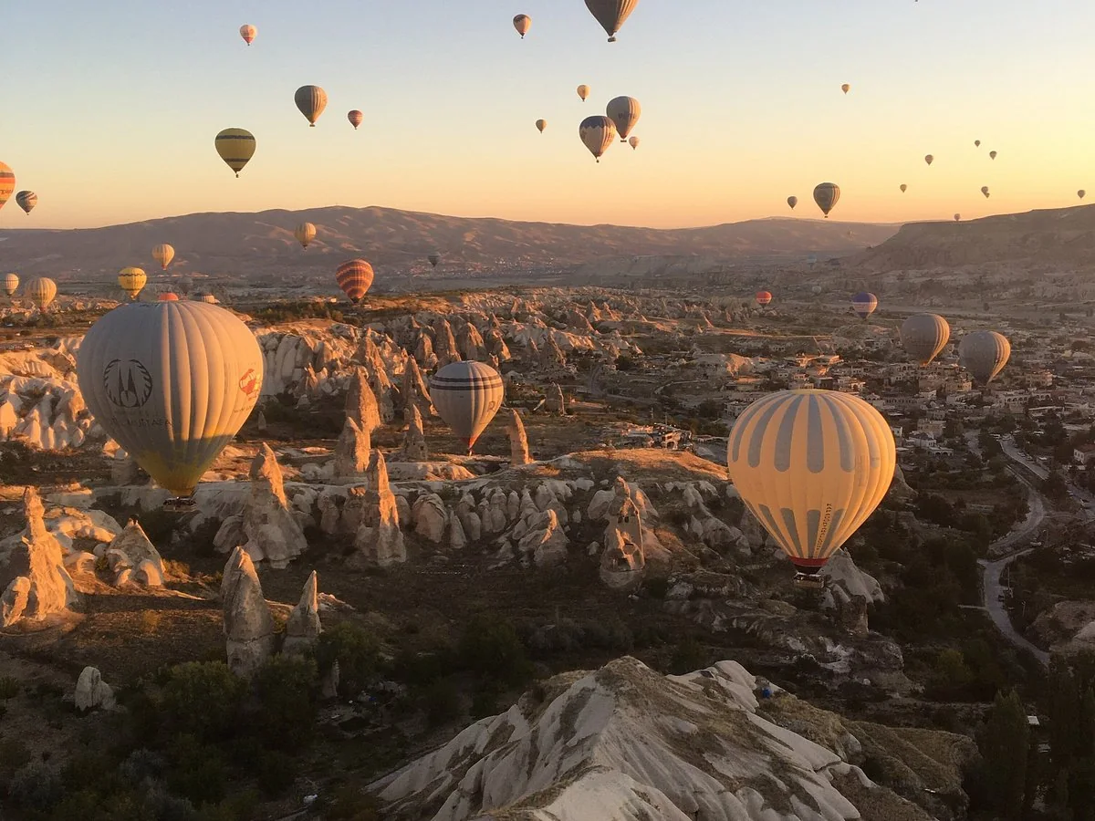 Sunrise hot air balloons over goreme in Cappadocia