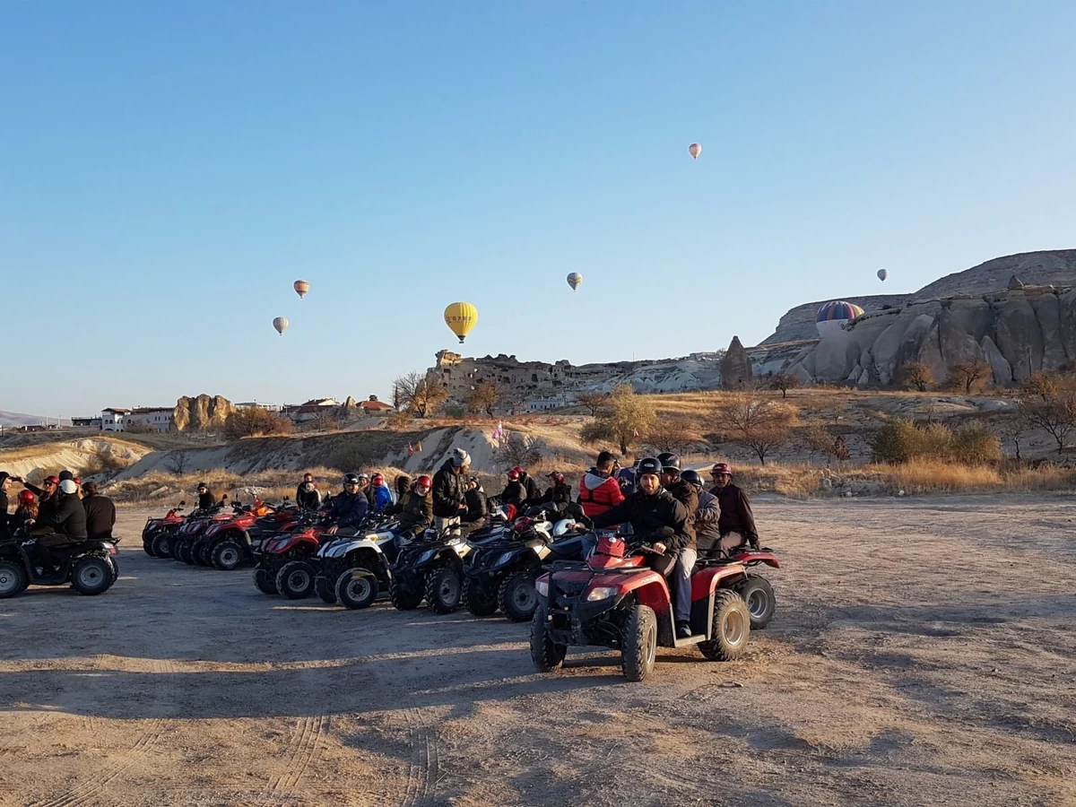 Group of riders beginning a sunrise quad biking tour in Cappadocia
